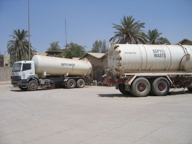 two trucks carrying septic wastes